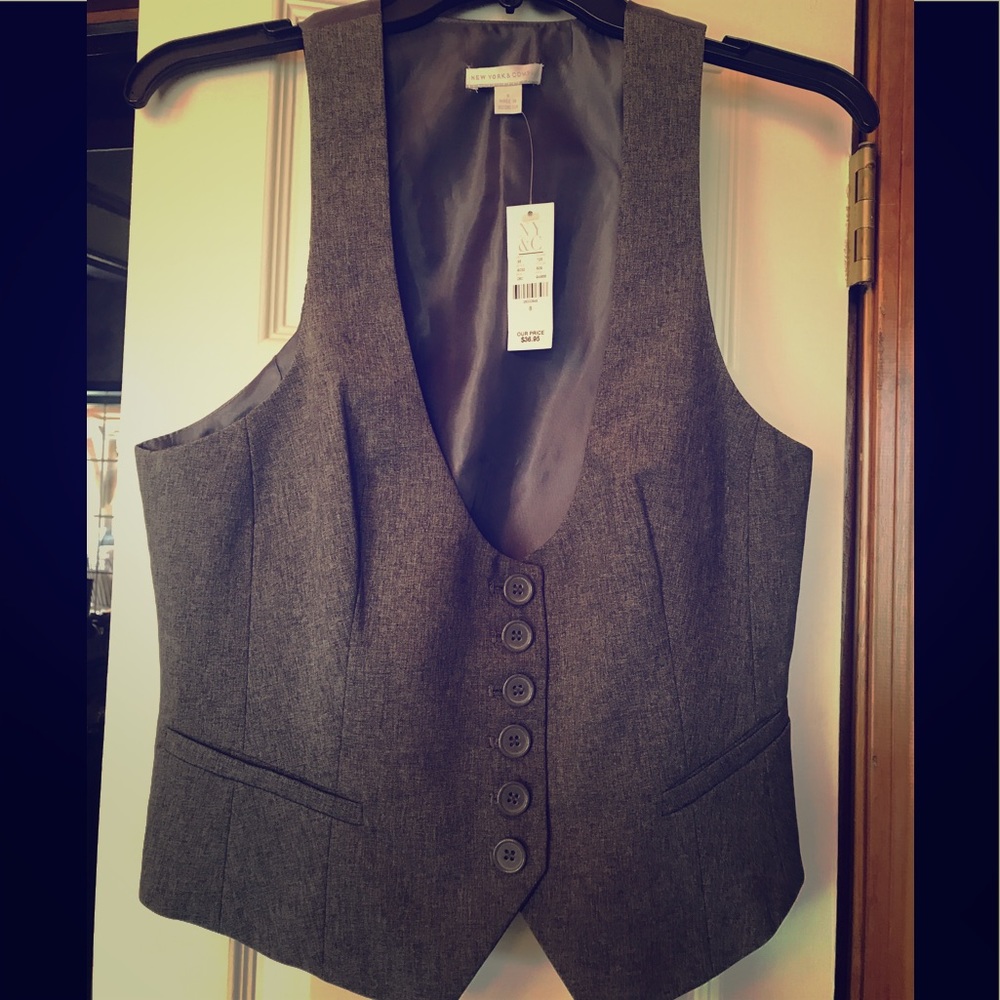 Fitted ladies vest with adjustable waist strap